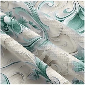 May include: A fabric featuring a flowing, abstract pattern with soft, muted shades of sage green, cream, and light gray. The design consists of swirling, organic shapes and curved lines that create a sense of movement across the textured surface.