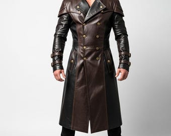 May include: A two-tone leather trench coat in brown and black. The coat features a double-breasted design with gold-colored buttons, a wide collar, and epaulets. The sleeves have buckle details. The coat is knee-length.