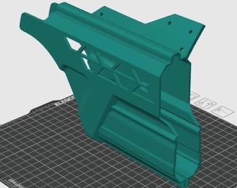 May include: A teal-colored 3D-printed object with geometric cutouts and a tubular design. The object has a complex shape with multiple angles and a textured surface. It is placed on a black grid.