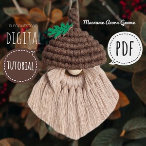 May include: A brown macrame acorn gnome ornament with a pink tassel beard and a green leaf on top. The ornament is hanging from a string. The text "Macrame Acorn Gnome" and "PDF" are visible in the image. The text "DIGITAL TUTORIAL" is also visible in the image.