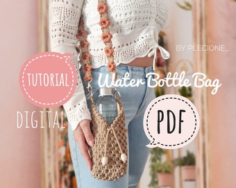 May include: A digital tutorial for crocheting a water bottle bag. The image shows a woman wearing a white crocheted top and blue jeans, holding a crocheted water bottle bag. The bag is made with beige yarn and has a brown strap. The text "Water Bottle Bag" is written in black on a pink background.