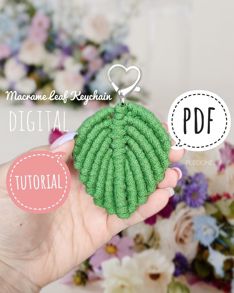May include: A green macrame leaf keychain with a silver heart-shaped clasp. The keychain is held in a hand with a floral background. The text "Macrame Leaf Keychain DIGITAL TUTORIAL PDF" is visible in the image.