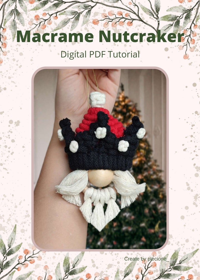 May include: A macrame nutcracker ornament with a red and black crown, white beard, and wooden face. The ornament is held in a hand against a blurred background of a Christmas tree. The text "Macrame Nutcracker" and "Digital PDF Tutorial" is displayed above the ornament.