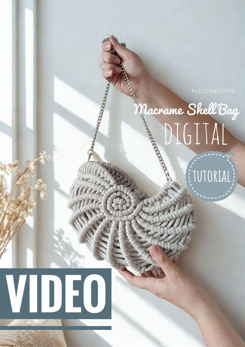 May include: A light grey macrame shell bag with a silver chain strap. The bag is held by a person's hands against a white background. The text "Macrame Shell Bag DIGITAL TUTORIAL VIDEO" is displayed.