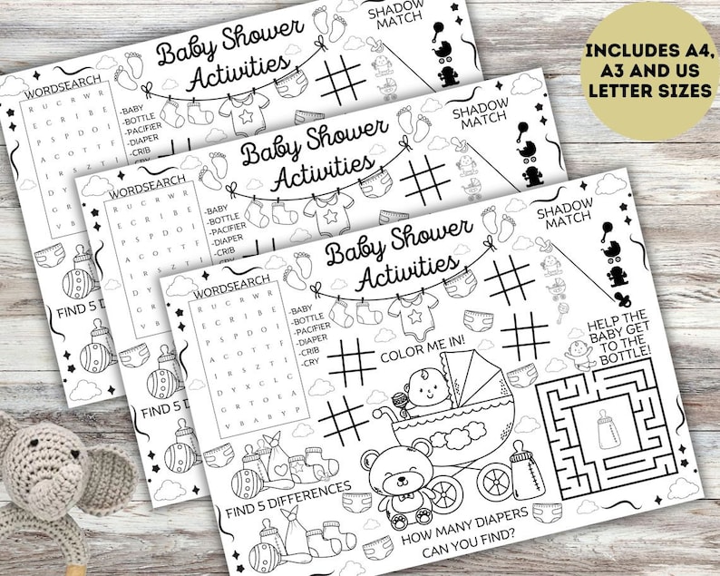 K&ouml;nnte beinhalten: Druckbare Babyparty-Aktivit&auml;tsbl&auml;tter mit Spielen wie Wortsuche, Finde die Unterschiede, Male mich aus und einem Labyrinth. Die Bl&auml;tter enthalten den Text "Baby Shower Activities" und "Enth&auml;lt A4, A3 und US-Briefgr&ouml;&szlig;en".