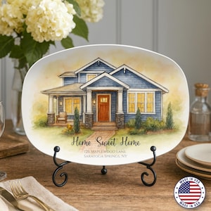 May include: Oval serving platter with a watercolor illustration of a blue house with a red door. The platter has the text "Home Sweet Home" and address details. The platter is displayed on a black metal stand.
