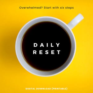 May include: A white coffee cup filled with dark liquid, possibly coffee, against a bright yellow background. The words "DAILY RESET" are centered in white text within the cup. Above the cup, the text reads "Overwhelmed? Start with six steps."