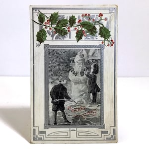Vintage geprägte Weihnachtspostkarte - Anfang 1900er Jahre Schneemann, Weihnachtsmann, Silberrahmen, Weihnachten im Freien Winterszene, Edwardian Cottagecore