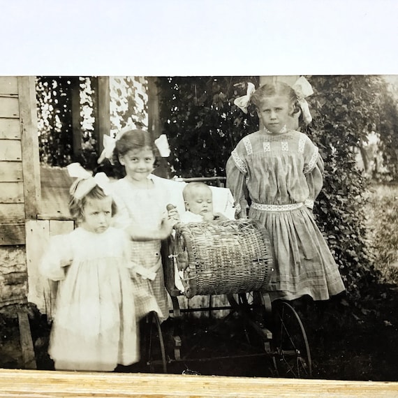 Early 1900s postcard photo of 2 infants in baby carriage Early 1900s postcard photo of 2 infants in baby carriage