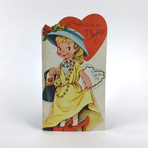 Tarjeta de San Valentín vintage para hija - MCM Chica rubia de los años 60 jugando a vestir a San Valentín - Volland usado troquelado en relieve Tarjetas de felicitación