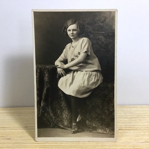 1920s Teenager with Subtle Smile - Unused Sepia Real Photo Postcard, Chicago Studio - Flapper, Bob Cut Hairstyle, Jazz Age, Roaring Twenties