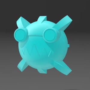 May include: A light blue, spherical, 3D-rendered object with a cartoonish design. It features two circular eye-like shapes, angular protrusions, and a jagged mouth-like detail. The object appears to be floating against a gray background.