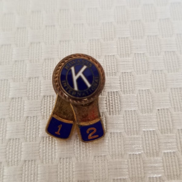 Vintage 1950's Movable tab International Kiwanis Gold filled Enamel Lapel or Hat pin. Souvenir. Free shipping.