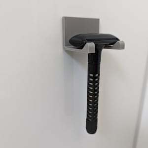 Supporto per rasoio di sicurezza da incollare (ad esempio su piastrelle/finestre nelle cabine doccia) - adatto a tutti i comuni rasoi di sicurezza