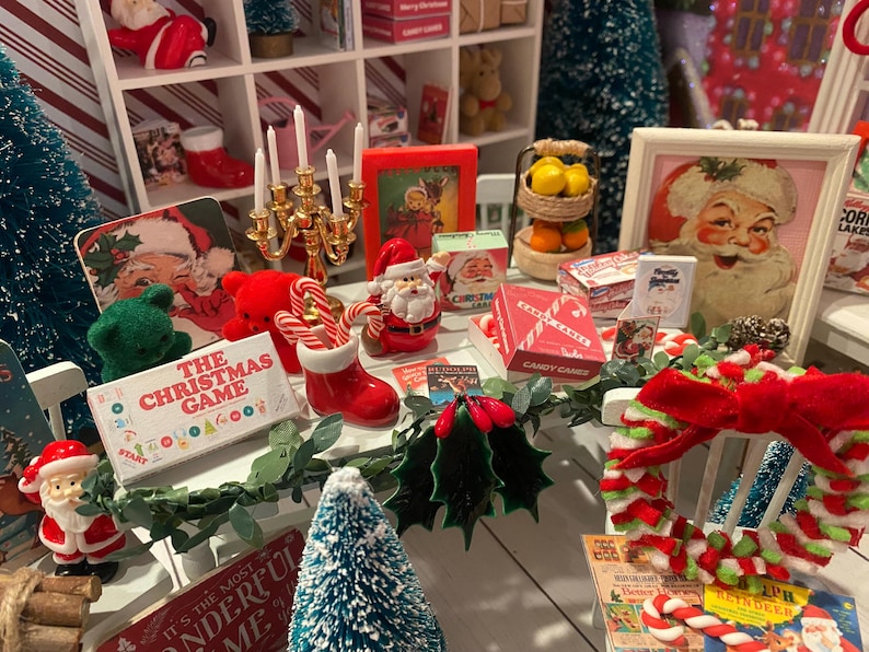 Miniature Christmas General Store, Dollhouse Signs, Firewood, Pinecones, Greenery, Cards, Candy Canes, DVD's Books, Albums, Santa, Art, 1:12 image 2