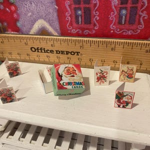 Miniature Christmas General Store, Dollhouse Signs, Firewood, Pinecones, Greenery, Cards, Candy Canes, DVD's Books, Albums, Santa, Art, 1:12 Box of Cards-12