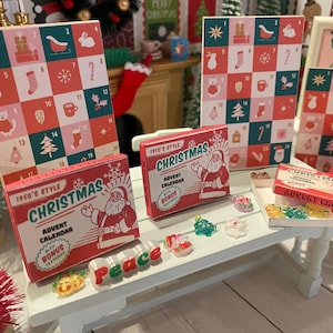 May include: A miniature Christmas scene with two red and green advent calendars, one with the text "1950's Style Christmas Advent Calendar with Bonus Textures" and the other with the text "Christmas Advent Calendar". There are also small Christmas ornaments and a white table with a red and green Christmas tree.