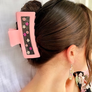 Handmade pink real pressed flower claw clips.