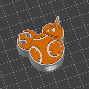 May include: Orange and white 3D printed charm of a robot character with a single antenna. The robot has a round body with a circular design and a small arm extending to the side.
