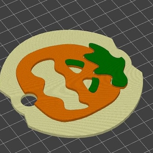May include: A 3D-printed pumpkin-shaped keychain. The keychain features a light tan outer ring, an orange pumpkin, and a green stem. The pumpkin has cut-out details and a small hole for attaching to a keyring.