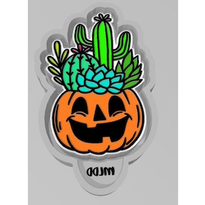 May include: A smiling jack-o'-lantern pumpkin with a green cactus and succulents growing out of the top. The pumpkin is orange and the cactus is green. The succulents are green, blue, and purple.