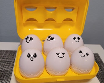 TOMY Hide and Squeak Eggs