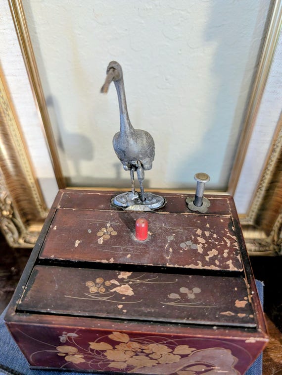 japanese cigarette dispenser Antique Japanese Mechanical Cigarette Dispenser With Metal Crane