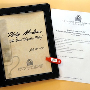 May include: A black leather-bound folder with the text "Philip Marlowe" and "The Good Neighbor Policy" on a vintage-style paper. Includes a red USB drive and a sheet with text about a radio kit.