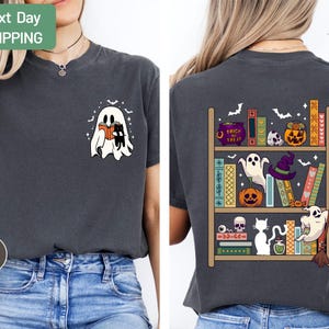 a woman wearing a t - shirt with a ghost on it
