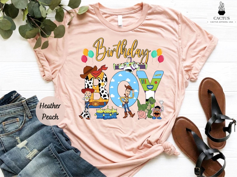 a pink birthday shirt with a cartoon character on it