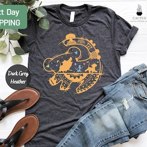 a t - shirt that says next day shipping on it next to a pair of