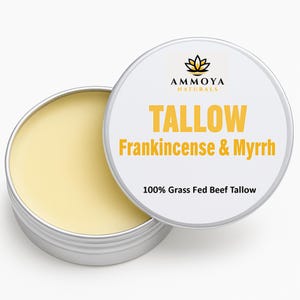 May include: A silver tin of tallow, partially open to show a pale yellow balm. The lid displays the text "TALLOW Frankincense & Myrrh" in yellow, with the brand logo and "100% Grass Fed Beef Tallow" underneath, on a white background.