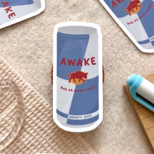 Red Bull Inspired - “Awake but at what cost?” Vinyl Sticker, Waterproof, Hydroflask, Laptop Decal