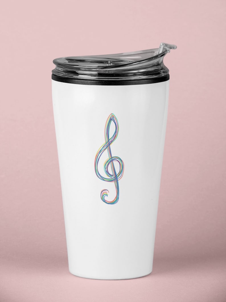 May include: White travel mug with a black lid and a colorful treble clef design. The musical symbol is rendered in a rainbow of colors, including red, blue, and green. The mug is designed to keep beverages hot or cold.