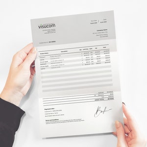 May include: A professional invoice from Visucom with a list of products and their prices. The invoice includes a subtotal, discount, and amount total. The invoice is signed with a handwritten signature.