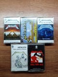 Metallica cassette tapes creeping death, and justice for all , kill em all, ride the lightning, master of puppets album