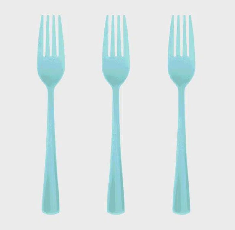 May include: A set of three identical light blue forks arranged vertically in a row. Each fork features a long, slender handle and four tines. The design is uniform, with a smooth, solid color finish across the entire surface of each utensil.