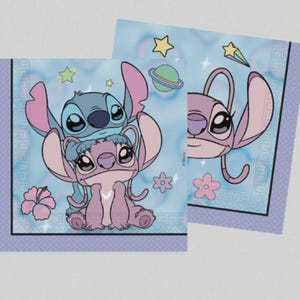 May include: Two square paper napkins featuring a light blue background with a repeating geometric border. The design displays blue and pink alien characters, a green planet with rings, yellow stars, and pink hibiscus flowers in a cartoon style.