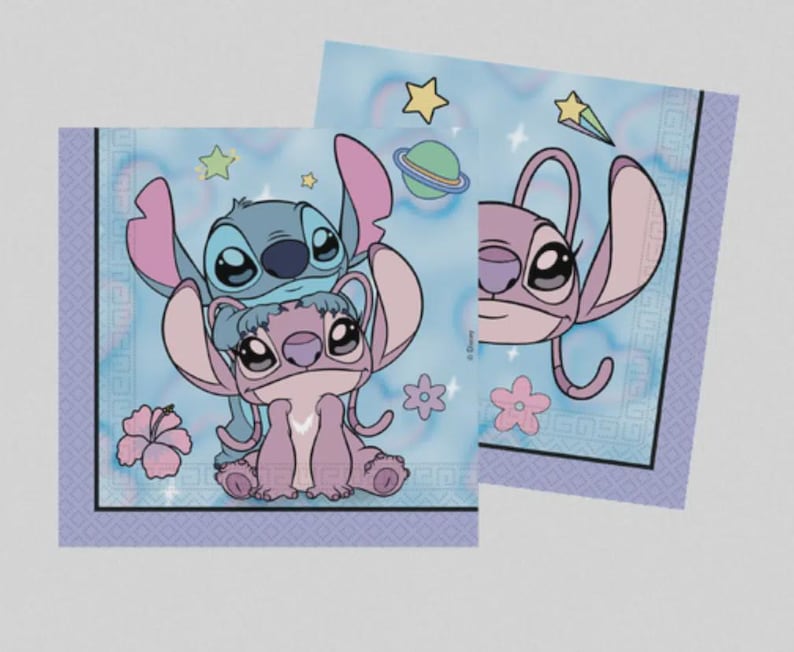 May include: Two square paper napkins featuring a light blue background with a repeating geometric border. The design displays blue and pink alien characters, a green planet with rings, yellow stars, and pink hibiscus flowers in a cartoon style.