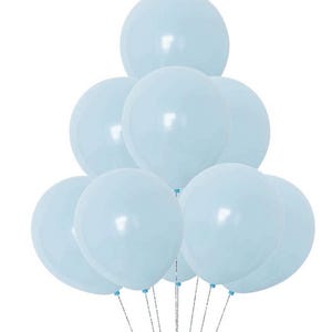 May include: A cluster of eight round, light blue balloons arranged in a pyramid formation. Each balloon has a smooth, matte finish and is attached to a thin, silver-colored string at the base, creating a uniform and cohesive decorative display.