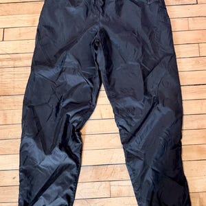 パンツ 90s Nike side full zip tech nylon pants Vintage 90s Nike Full Zip Side Navy Swishy Track Pants Bella