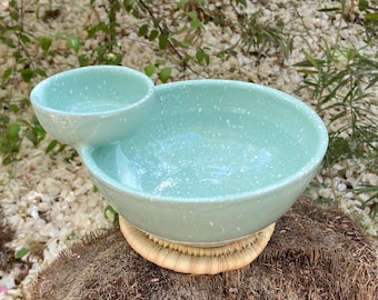 ceramic bowl with sauce bowl, free palm leaf stand.