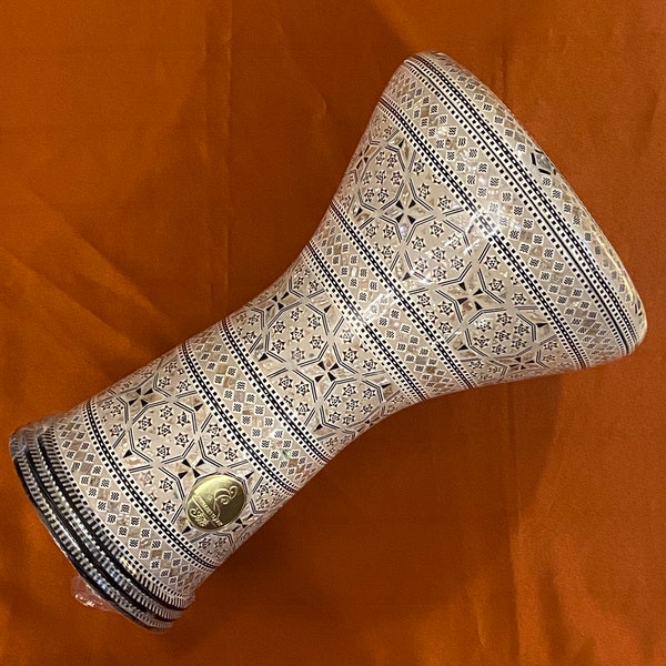17-inch Darbuka drum with mother-of-pearl inlay,made by Gawharet El Fan in Egypt. Includes a free bag, extra head, and tuning tool, handmade