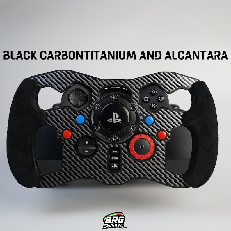May include: A black carbon fiber and Alcantara steering wheel for a gaming console. The wheel features a carbon fiber design with black suede grips and colorful buttons. The text "BLACK CARBONTITANIUM AND ALCANTARA" is displayed at the top.