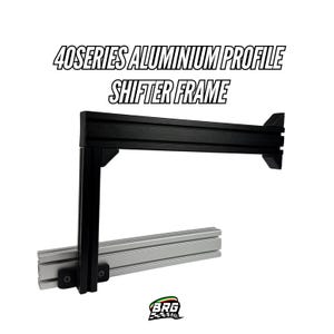 May include: Black 40 Series aluminum profile shifter frame. The frame has a horizontal top section and a vertical support, connected to a silver-colored base. The text "40 SERIES ALUMINIUM PROFILE SHIFTER FRAME" is displayed at the top.