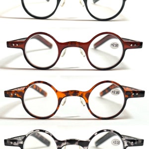 May include: Four pairs of round reading glasses with black, brown, tortoiseshell, and black and white frames. The glasses have spring hinges and are available in +2.00, +2.50, +2.00, and +3.00 strengths.