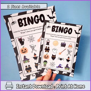 May include: Two printable Halloween bingo cards with black and white illustrations of ghosts, pumpkins, bats, witches, spiders, skeletons, and other Halloween imagery. The text on the cards reads "Bingo!" and "Listen for the items, mark them on your card, and shout "Bingo!" when you get 4 items in a row."