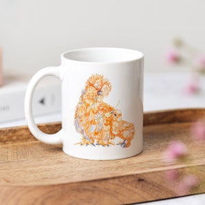 Adorable Silkie Chicken Mom and Chick Mug - A  chick gifting a flower to it’s silkie mama - the perfect gift for chicken moms!