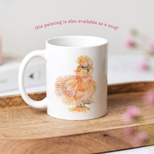 A painting of the silkie chickens printed onto a white ceramic mug.