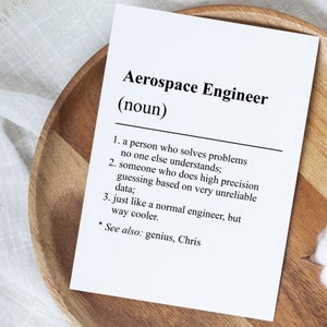 May include: A black and white printable definition of an aerospace engineer. The definition reads: "Aerospace Engineer (noun) 1. a person who solves problems no one else understands; 2. someone who does high precision guessing based on very unreliable data; 3. just like a normal engineer, but way cooler. * See also: genius, Chris"